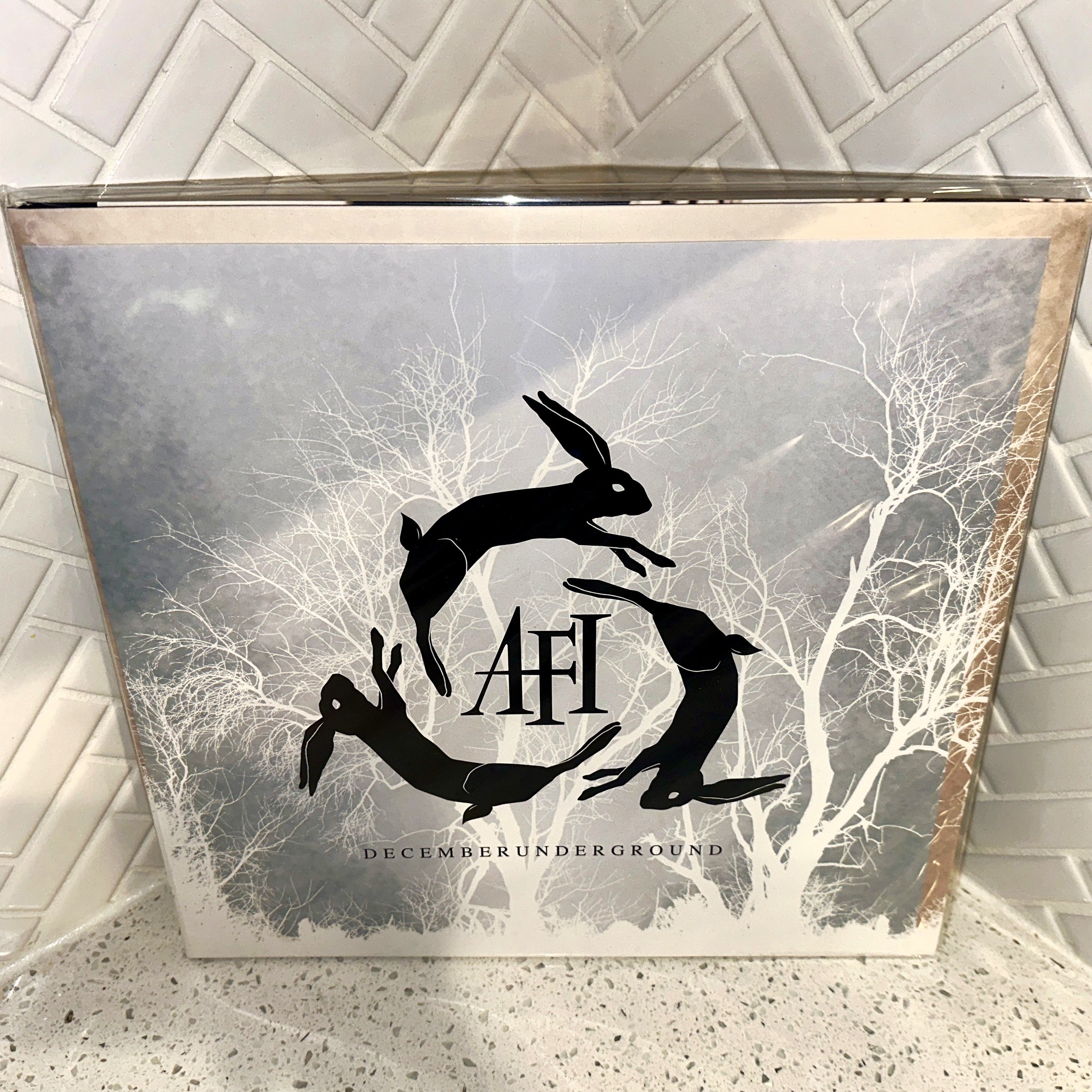 AFI Decemberunderground 2LP Numbered IVC Edition Bone Colored Vinyl Record Front – Limited Collectibles