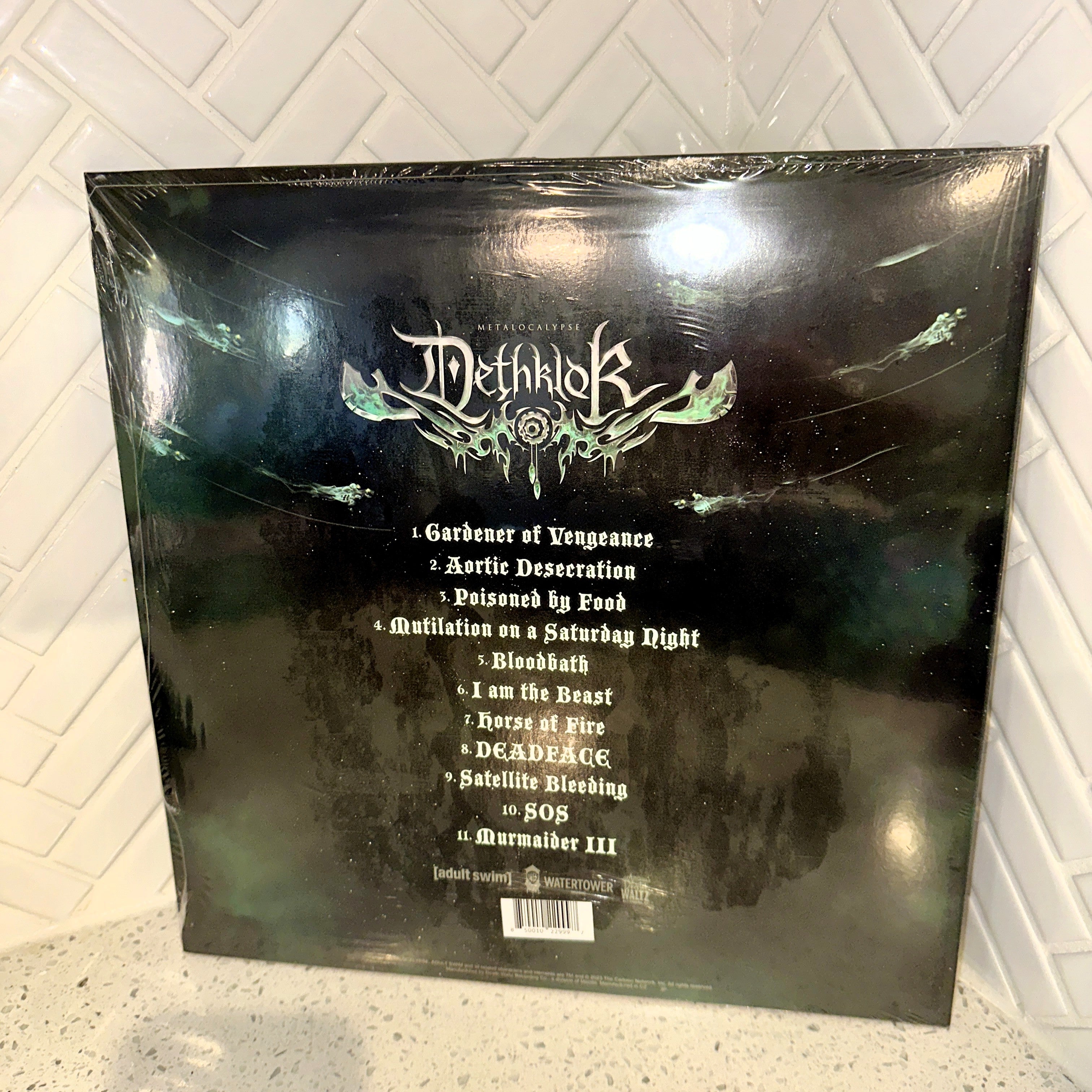 Dethklok - Dethalbum IV LP - Limited Black Green Marble Vinyl - Signed – Limited Collectibles