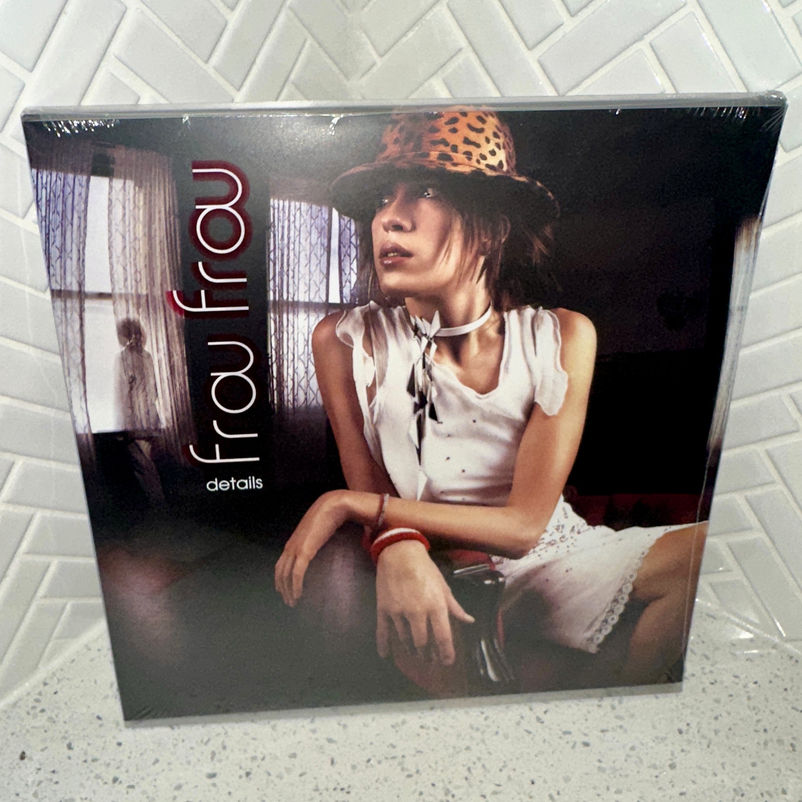 Frou Frou Details LP Limited Edition  IVC Purple Tangerine Vinyl Record Front – Limited Collectibles