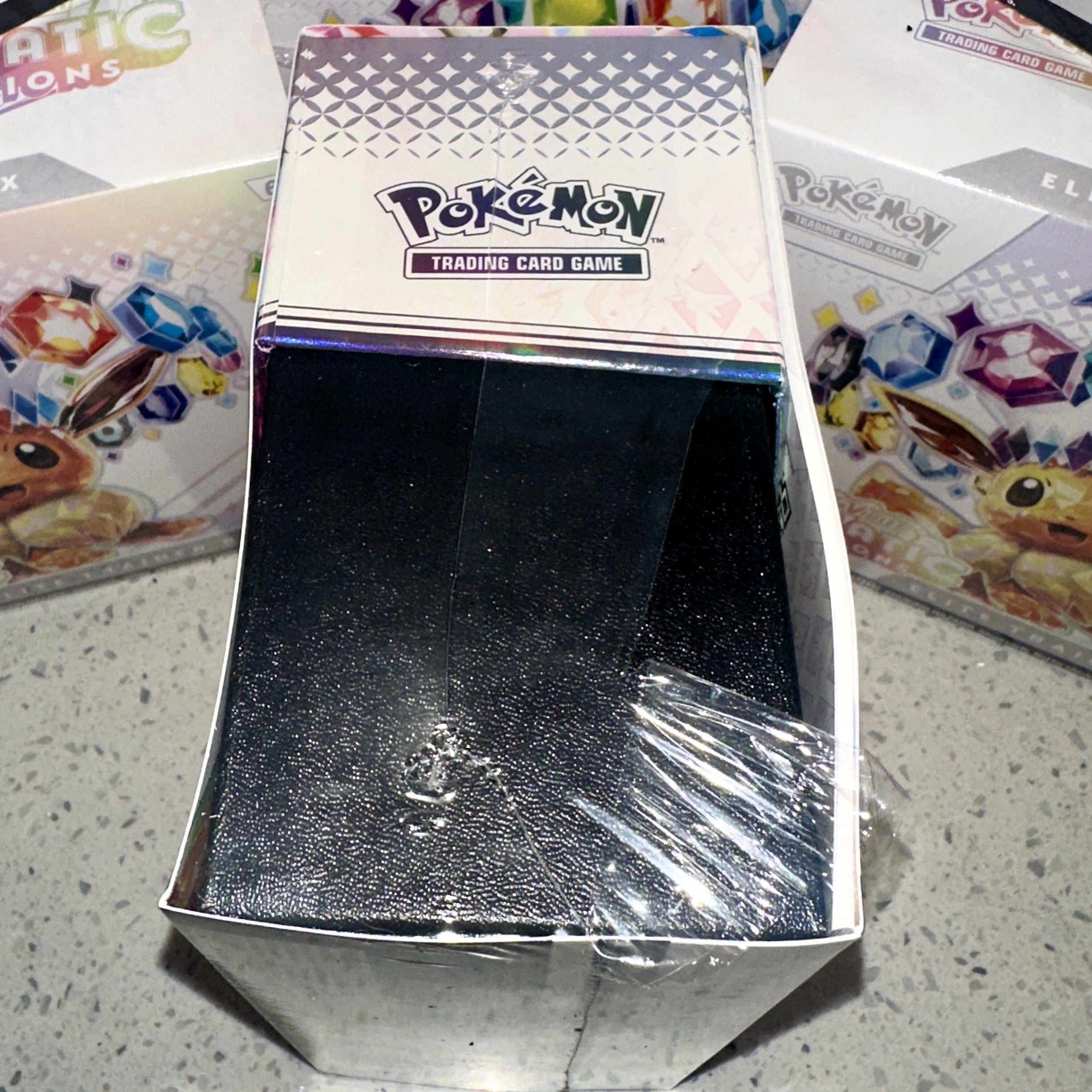 Pokémon TCG Scarlet Violet Prismatic Evolutions Elite Trainer Box Scratch n Dent – Limited Collectibles