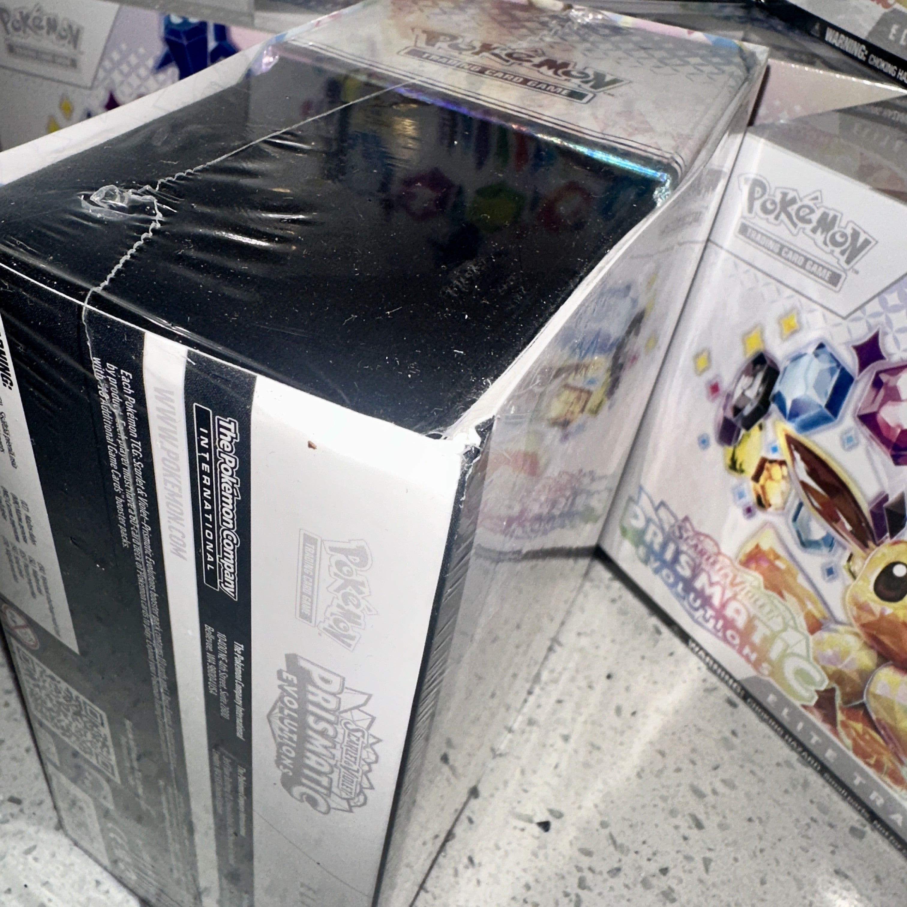 Pokémon TCG Scarlet Violet Prismatic Evolutions Elite Trainer Box Scratch n Dent – Limited Collectibles