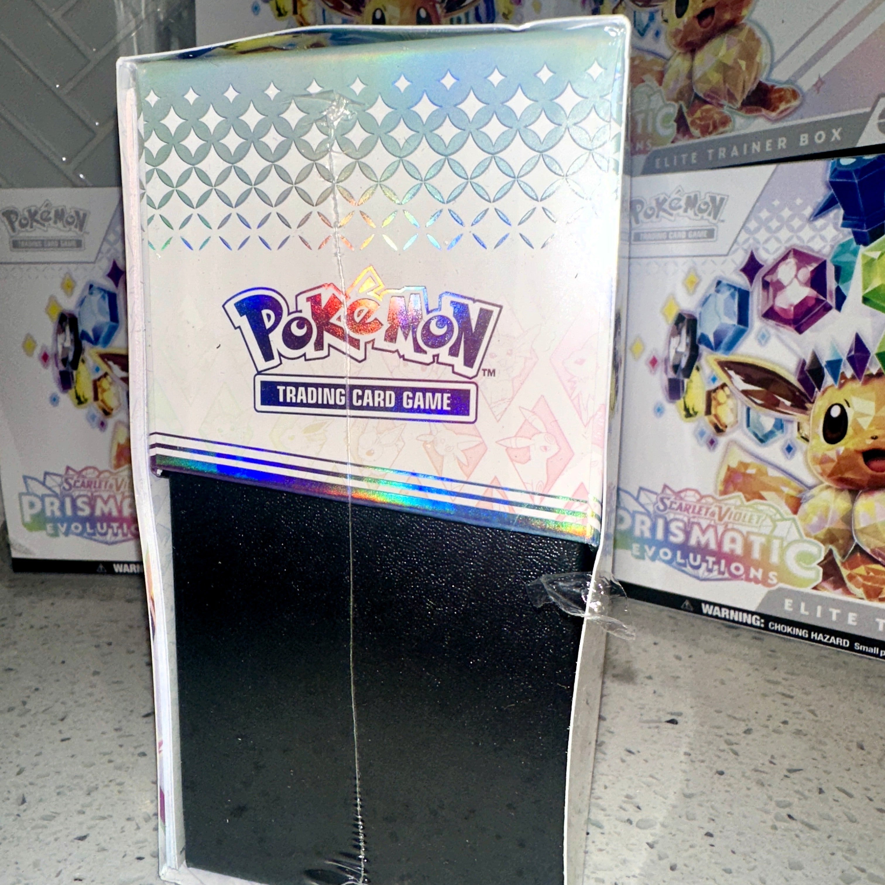 Pokémon TCG Scarlet Violet Prismatic Evolutions Elite Trainer Box Scratch n Dent – Limited Collectibles