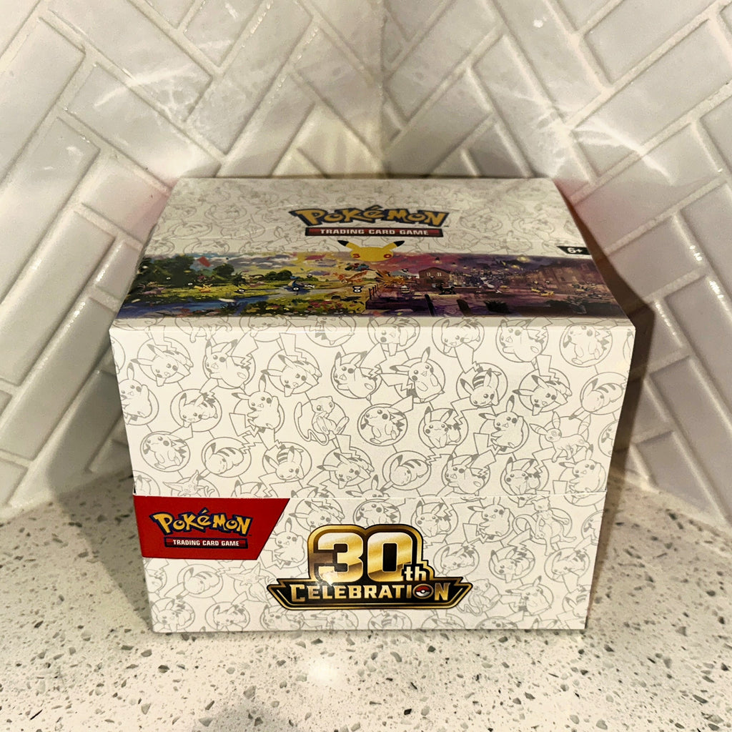 Pokemon TCG Mega Evolution 30th Celebration Mini Tin Collection Display Front
