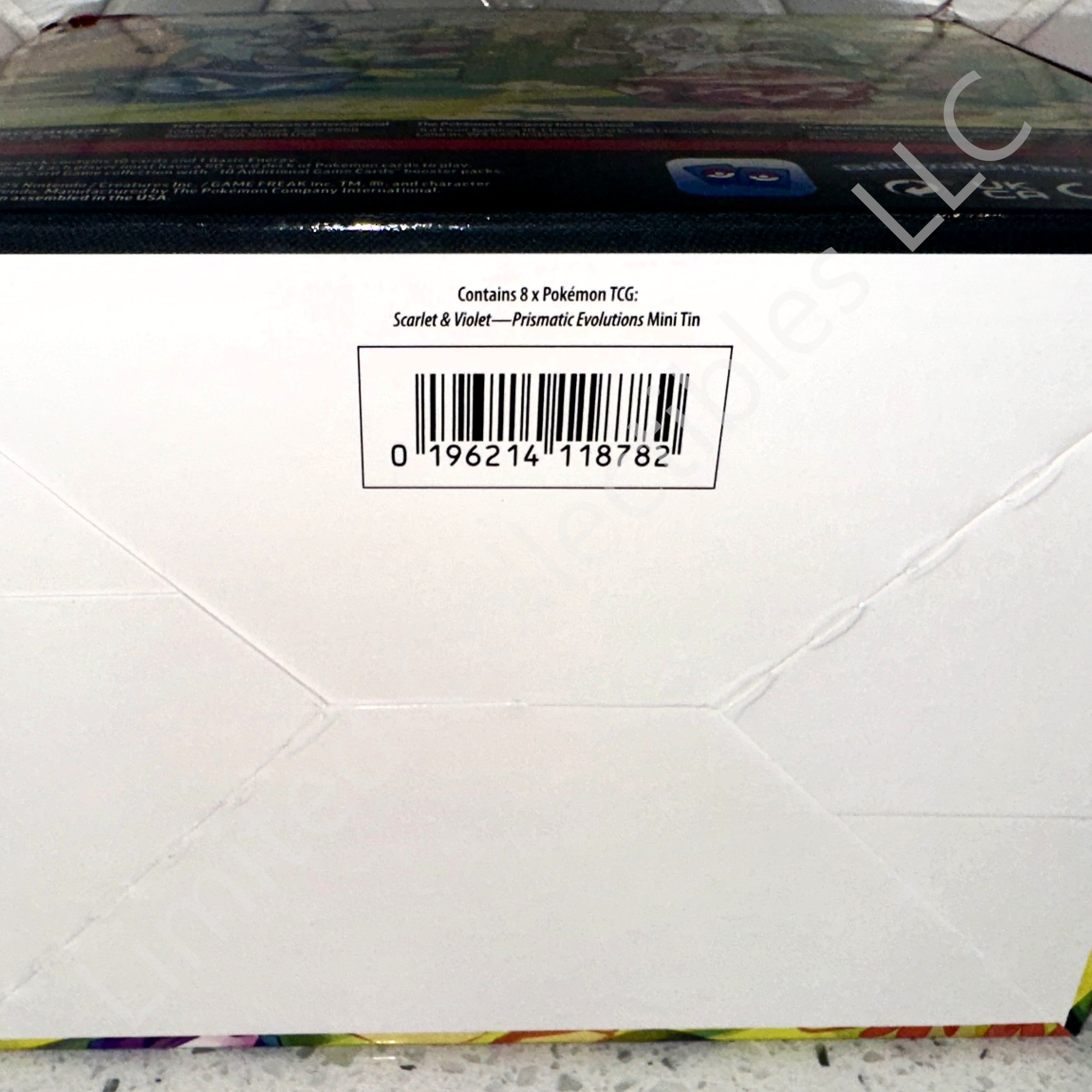 Pokémon TCG Scarlet Violet Prismatic Evolutions Randomly Select Mini Tin Display Bottom UPC Barcode – Limited Collectibles
