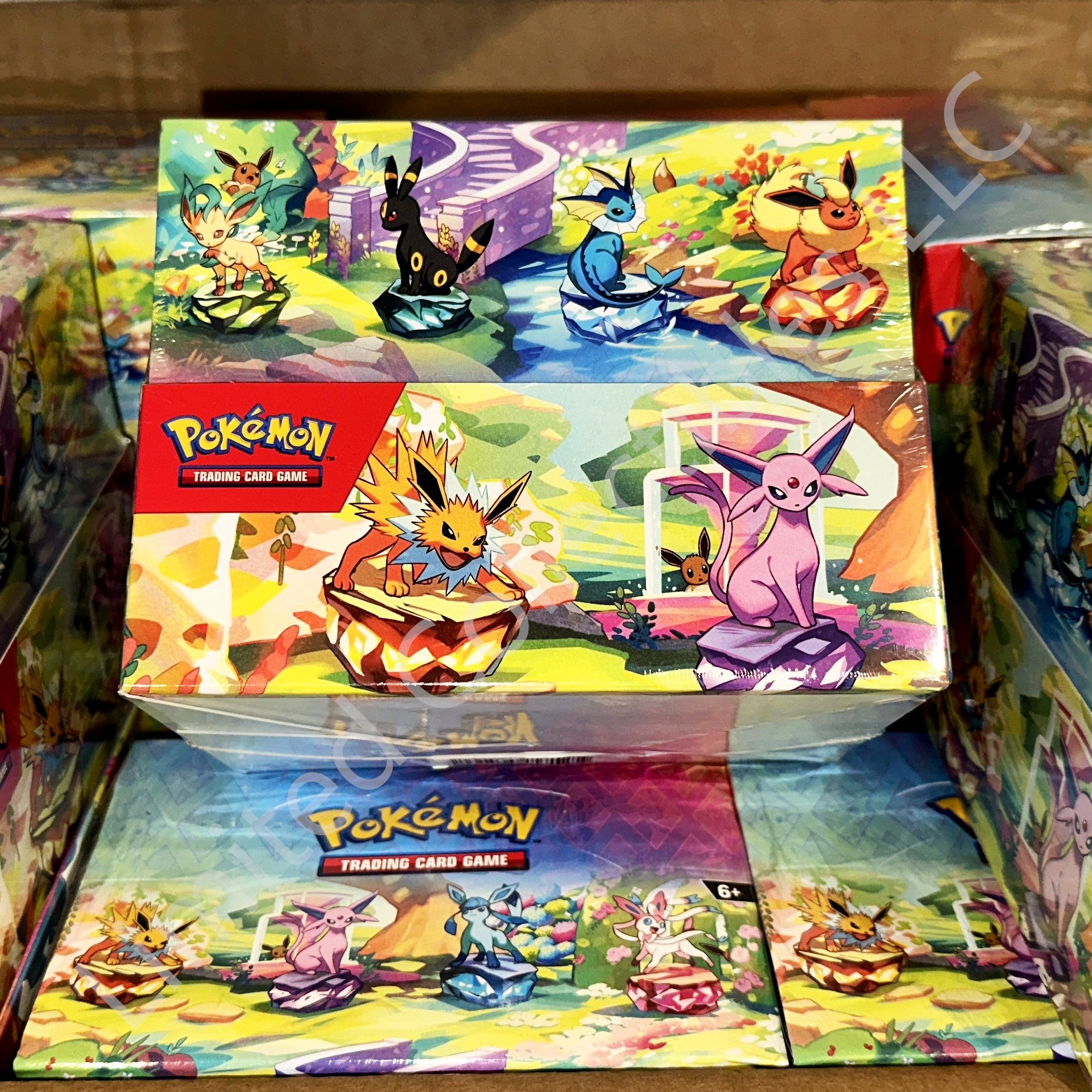 Pokémon TCG Scarlet Violet Prismatic Evolutions Randomly Select Mini Tin Display Front – Limited Collectibles