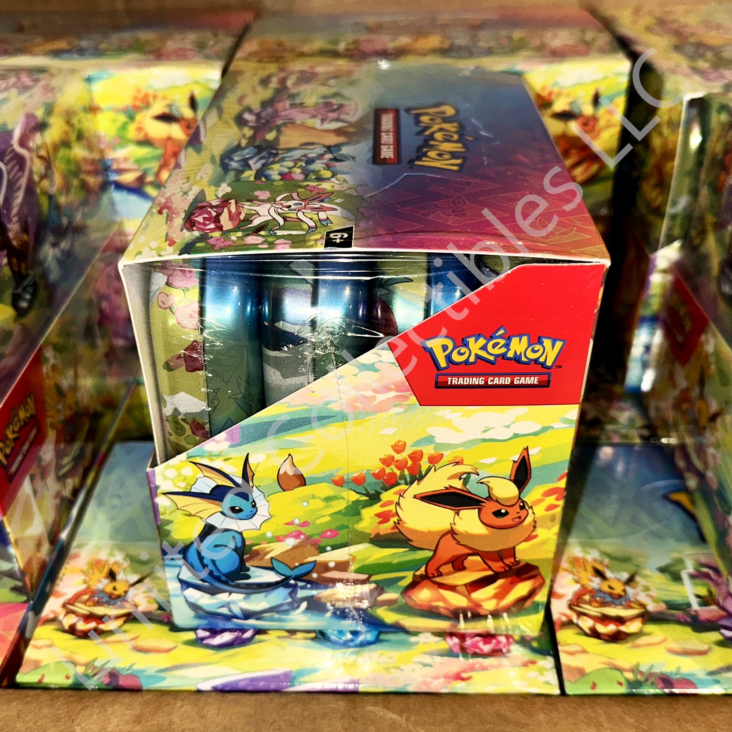 Pokémon TCG Scarlet Violet Prismatic Evolutions Randomly Select Mini Tin Display Side – Limited Collectibles