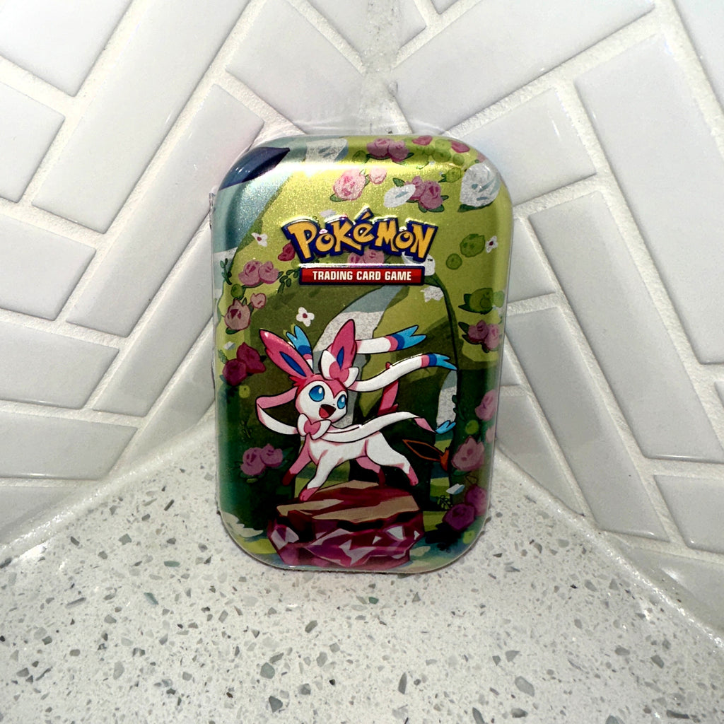 Pokémon TCG Scarlet Violet Prismatic Evolutions Randomly Select Mini Tin Front