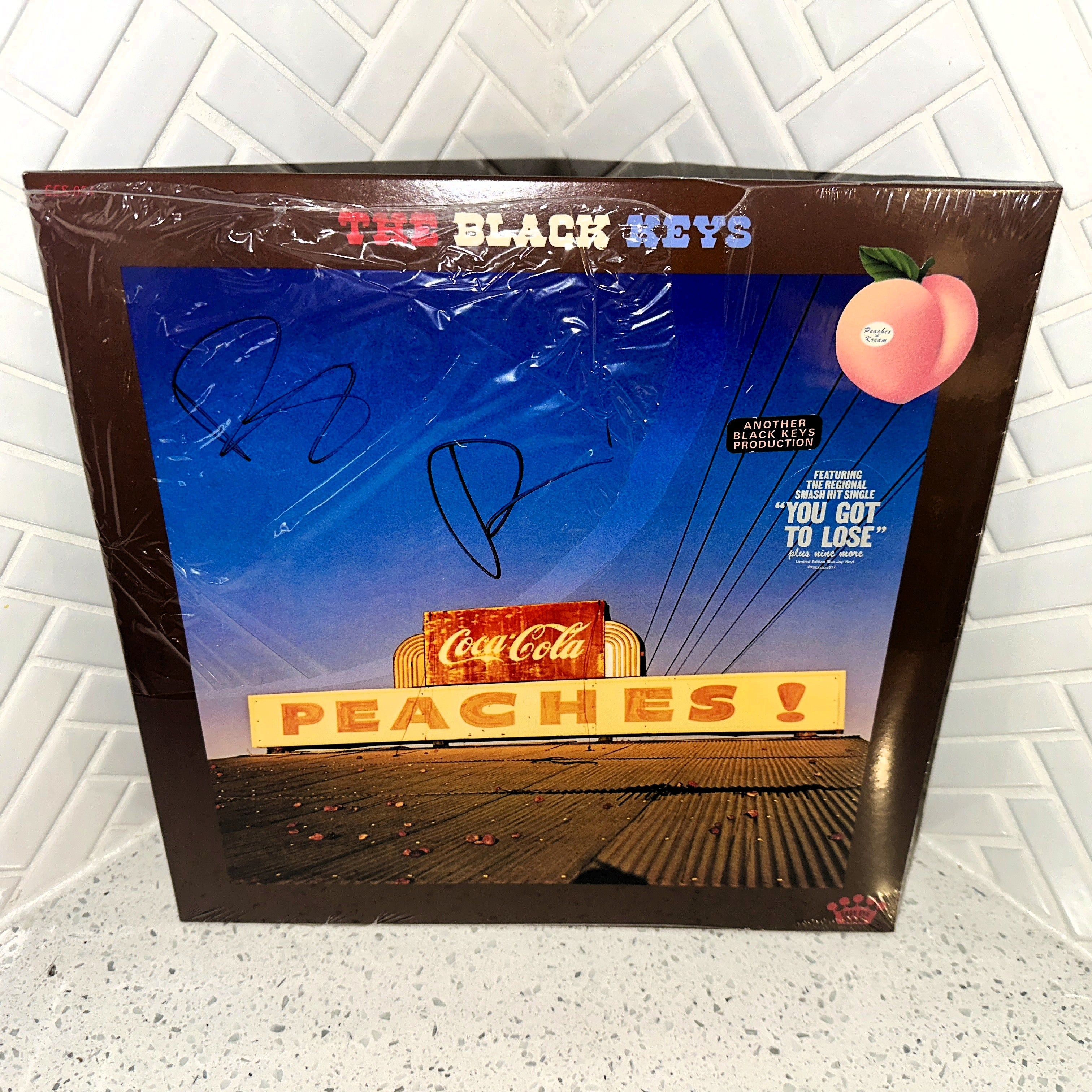 The Black Keys Peaches! LP Rare Band Signed Cover Blue Jay Colored Vinyl Record Front – Limited Collectibles